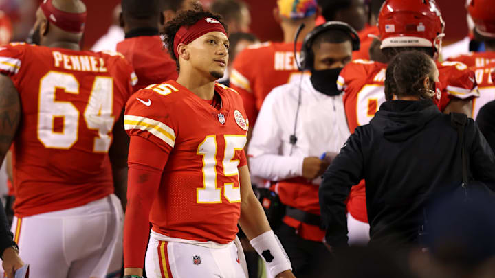 KANSAS CITY, MISSOURI – OCTOBER 05: Patrick Mahomes #15 of the Kansas City Chiefs looks on from the sideline during the game against the New England Patriots at Arrowhead Stadium on October 05, 2020 in Kansas City, Missouri. (Photo by Jamie Squire/Getty Images)