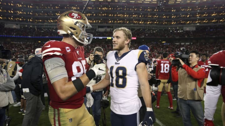Dec 21, 2019; Santa Clara, California, USA; San Francisco 49ers tight end George Kittle (85) meets with Los Angeles Rams wide receiver Cooper Kupp (18) after the game at Levi's Stadium. Mandatory Credit: Cary Edmondson-USA TODAY Sports