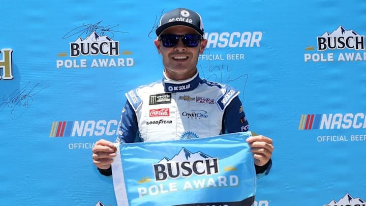 SONOMA, CA - JUNE 23: Kyle Larson, driver of the #42 DC Solar Chevrolet, poses for a photo after winning the pole award during qualifying for the Monster Energy NASCAR Cup Series Toyota/Save Mart 350 at Sonoma Raceway on June 23, 2018 in Sonoma, California. (Photo by Brian Lawdermilk/Getty Images)