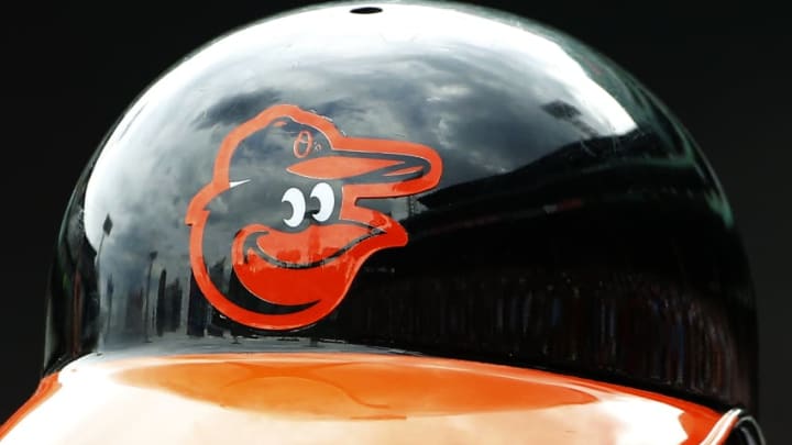 BOSTON, MA - JUNE 25: The Baltimore Orioles logo is seen on a batting helmet during the game between the Boston Red Sox and the Baltimore Orioles at Fenway Park on June 25, 2015 in Boston, Massachusetts. (Photo by Winslow Townson/Getty Images)