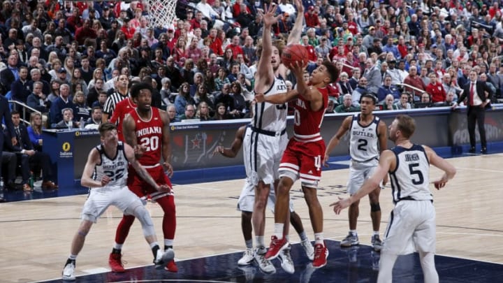 INDIANAPOLIS, IN - DECEMBER 15: Rob Phinisee #10 of the Indiana Hoosiers drives to the basket against Joey Brunk #50 of the Butler Bulldogs in the first half of the Crossroads Classic at Bankers Life Fieldhouse on December 15, 2018 in Indianapolis, Indiana. Indiana won 71-68. (Photo by Joe Robbins/Getty Images)