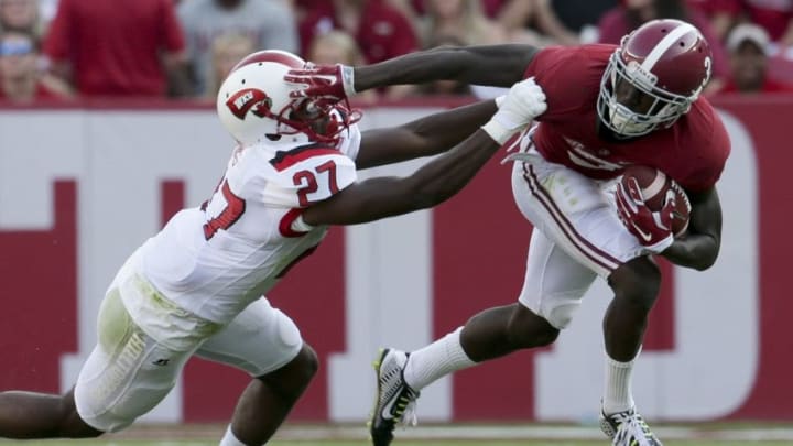 Sep 10, 2016; Tuscaloosa, AL, USA; Alabama Crimson Tide wide receiver Calvin Ridley (3) pushes away from Western Kentucky Hilltoppers defensive back Martavius Mims (27) at Bryant-Denny Stadium. The Tide defeated the Hilltoppers 38-10. Mandatory Credit: Marvin Gentry-USA TODAY Sports