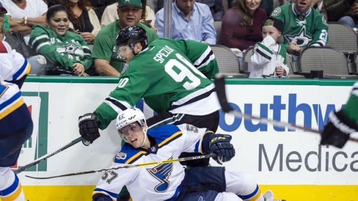 Nov 3, 2016; Dallas, TX, USA; Dallas Stars center Jason Spezza (90) and St. Louis Blues left wing David Perron (57) fight for the puck during the third period at the American Airlines Center. The Stars beat the Blues 6-2. Mandatory Credit: Jerome Miron-USA TODAY Sports