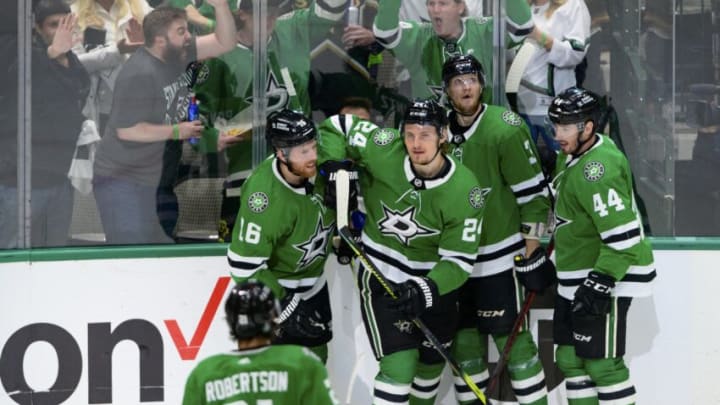 May 13, 2022; Dallas, Texas, USA; Dallas Stars left wing Jason Robertson (21) and center Joe Pavelski (16) and center Roope Hintz (24) and defenseman John Klingberg (3) and defenseman Joel Hanley (44) celebrates a goal scored by Hintz against the Calgary Flames during the first period in game six of the first round of the 2022 Stanley Cup Playoffs at American Airlines Center. Mandatory Credit: Jerome Miron-USA TODAY Sports