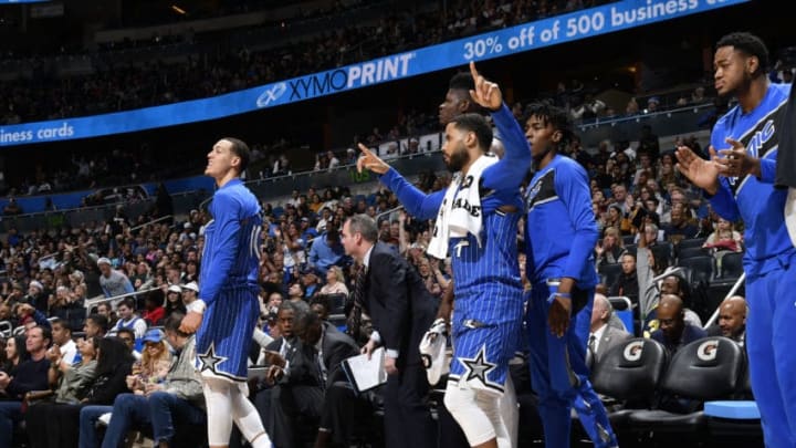 ORLANDO, FL - DECEMBER 23: D.J. Augustin #14 of the Orlando Magic and the Orlando Magic bench celebrate during the game against the Miami Heat on December 23, 2018 at Amway Center in Orlando, Florida. NOTE TO USER: User expressly acknowledges and agrees that, by downloading and or using this photograph, User is consenting to the terms and conditions of the Getty Images License Agreement. Mandatory Copyright Notice: Copyright 2018 NBAE (Photo by Fernando Medina/NBAE via Getty Images)