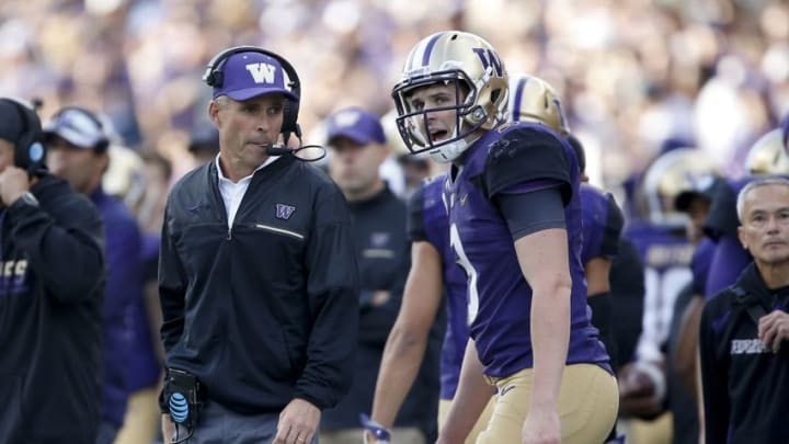 Oct 22, 2016; Seattle, WA, USA; Washington Huskies quarterback Jake Browning (3) talks to head coach Chris Petersen after Browning scored a rushing touchdown against the Oregon State Beavers during the first quarter at Husky Stadium. Mandatory Credit: Jennifer Buchanan-USA TODAY Sports
