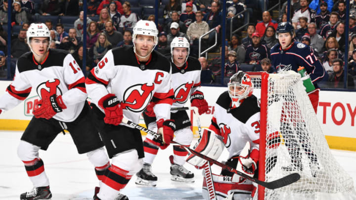 COLUMBUS, OH - DECEMBER 5: Nico Hischier #13, Andy Greene #6 and Sami Vatanen #45, all of the New Jersey Devils, help goaltender Cory Schneider #35 of the New Jersey Devils defend the net against the Columbus Blue Jackets on December 5, 2017 at Nationwide Arena in Columbus, Ohio. (Photo by Jamie Sabau/NHLI via Getty Images)