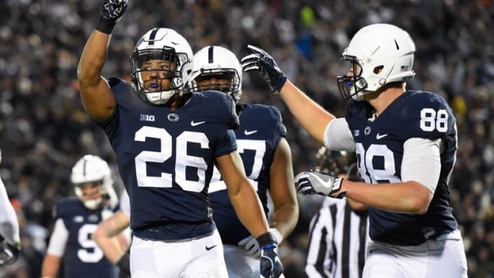 Nov 26, 2016; University Park, PA, USA; Penn State Nittany Lions running back Saquon Barkley (26) reacts following his touchdown run with teammate tight end Mike Gesicki (88) against the Michigan State Spartans during the second quarter at Beaver Stadium. Mandatory Credit: Rich Barnes-USA TODAY Sports