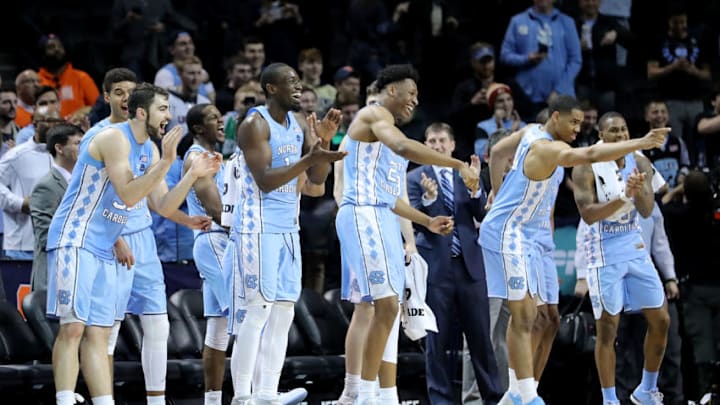 NEW YORK, NY - MARCH 08: The North Carolina Tar Heels bench reacts in the second half against the Miami (Fl) Hurricanes during the quarterfinals of the ACC Men's Basketball Tournament at Barclays Center on March 8, 2018 in the Brooklyn borough of New York City. (Photo by Abbie Parr/Getty Images)