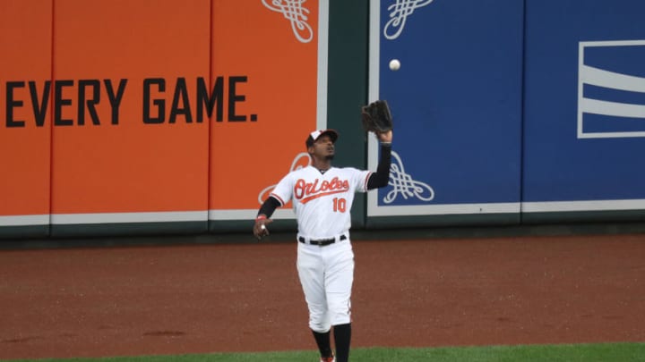 BALTIMORE, MD - JULY 23: Adam Jones #10 of the Baltimore Orioles catches a ball hit by Mookie Betts #50 of the Boston Red Sox (not pictured) for the first out of the first inning at Oriole Park at Camden Yards on July 23, 2018 in Baltimore, Maryland. (Photo by Rob Carr/Getty Images)