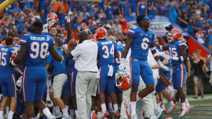 GAINESVILLE, FL - SEPTEMBER 16: The Florida Gators celebrate at the end of the game after they defeated the Tennessee Volunteers 26-20 at Ben Hill Griffin Stadium on September 16, 2017 in Gainesville, Florida. (Photo by Scott Halleran/Getty Images)