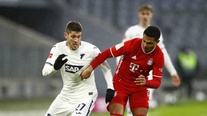 Serge Gnabry and Andrej Kramaric competing for the ball during the game between Bayern Munich and Hoffenheim at Allianz Arena. (Photo by Adam Pretty/Getty Images)