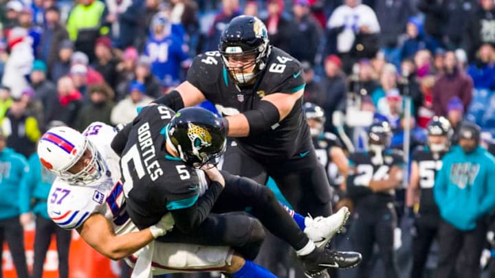 ORCHARD PARK, NY - NOVEMBER 25: Lorenzo Alexander #57 of the Buffalo Bills takes down Blake Bortles #5 of the Jacksonville Jaguars during the fourth quarter at New Era Field on November 25, 2018 in Orchard Park, New York. Buffalo defeats Jacksonville 24-21. (Photo by Brett Carlsen/Getty Images)