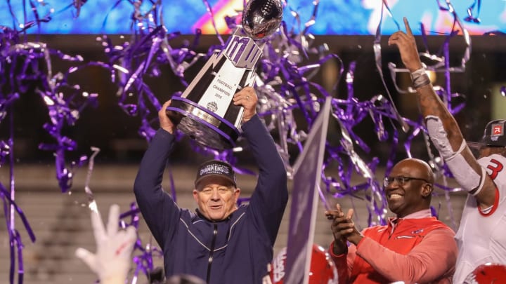 BOISE, ID – DECEMBER 1: Head Coach Jeff Tedford of the Fresno State Bulldogs holds up the championship trophy at the conclusion of the Mountain West Championship against the Boise State Broncos on December 1, 2018 at Albertsons Stadium in Boise, Idaho. Fresno State won the game 19-16 in overtime. (Photo by Loren Orr/Getty Images)