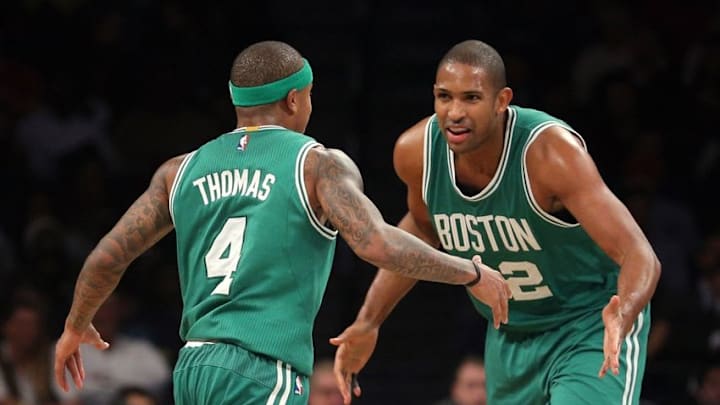 Nov 23, 2016; Brooklyn, NY, USA; Boston Celtics point guard Isaiah Thomas (4) celebrates with Boston Celtics center Al Horford (42) during the third quarter at Barclays Center. Mandatory Credit: Brad Penner-USA TODAY Sports