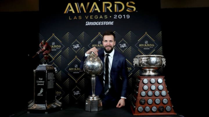 Nikita Kucherov of the Tampa Bay Lightning poses with the Ted Lindsay Award, the Hart Memorial Trophy and the Art Ross Trophy during the 2019 NHL Awards at the Mandalay Bay Events Center on June 19, 2019 in Las Vegas, Nevada. (Photo by Bruce Bennett/Getty Images)