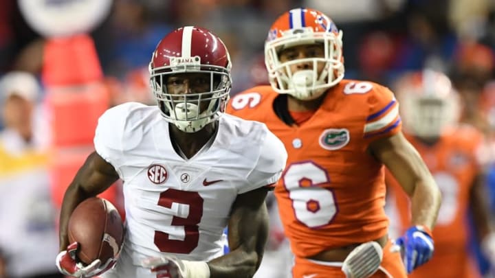 Dec 3, 2016; Atlanta, GA, USA; Alabama Crimson Tide wide receiver Calvin Ridley (3) runs the ball ahead of Florida Gators defensive back Quincy Wilson (6) during the second quarter of the SEC Championship college football game at Georgia Dome. Mandatory Credit: John David Mercer-USA TODAY Sports