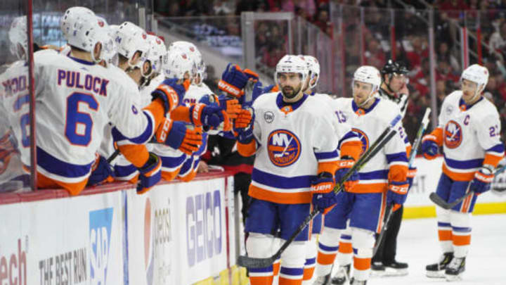 RALEIGH, NC – MAY 01: New York Islanders right wing Jordan Eberle (7) celebrates with players on the bench after a power-play goal during a game between the Carolina Hurricanes and the New York Islanders on May 1, 2019, at the PNC Arena in Raleigh, NC. (Photo by Greg Thompson/Icon Sportswire via Getty Images)