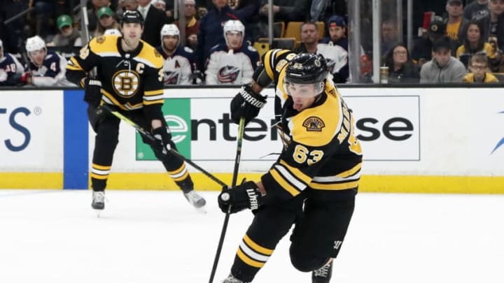 BOSTON, MA - MARCH 16: Boston Bruins left wing Brad Marchand (63) knifes in for the puck during a game between the Boston Bruins and the Columbus Blue Jackets on. March 16, 2019, at TD Garden in Boston, Massachusetts. (Photo by Fred Kfoury III/Icon Sportswire via Getty Images)