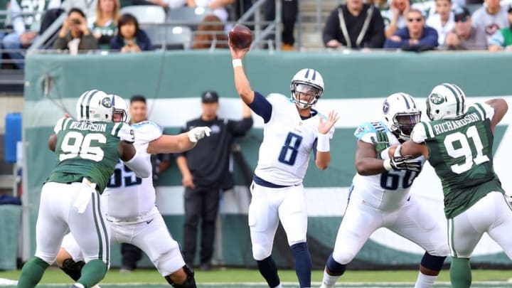 Dec 13, 2015; East Rutherford, NJ, USA; Tennessee Titans quarterback Marcus Mariota (8) throws a pass against the New York Jets during the second quarter at MetLife Stadium. Mandatory Credit: Brad Penner-USA TODAY Sports