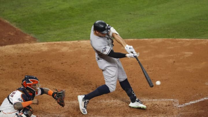 HOUSTON, TX - OCTOBER 19: Aaron Judge #99 of the New York Yankees singles in the ninth inning against the Houston Astros during Game Six of the League Championship Series at Minute Maid Park on October 19, 2019 in Houston, Texas. (Photo by Tim Warner/Getty Images)