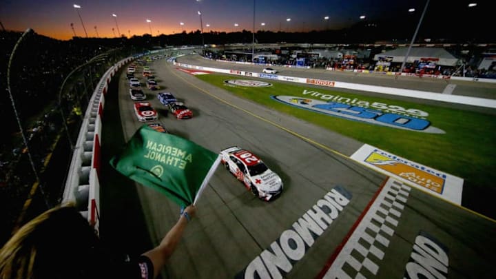 RICHMOND, VA - SEPTEMBER 09: Matt Kenseth, driver of the #20 Hurricane Harvey Relief Toyota, leads Denny Hamlin, driver of the #11 FedEx Express Toyota, at the start of the Monster Energy NASCAR Cup Series Federated Auto Parts 400 at Richmond Raceway on September 9, 2017 in Richmond, Virginia. (Photo by Sarah Crabill/Getty Images)