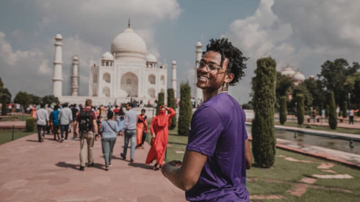 AGRA, INDIA - OCTOBER 2: De'Aaron Fox #5 of the Sacramento Kings poses for a portrait at the Taj Mahal on October 2, 2019 in Agra, India. NOTE TO USER: User expressly acknowledges and agrees that, by downloading and or using this Photograph, user is consenting to the terms and conditions of the Getty Images License Agreement. Mandatory Copyright Notice: Copyright 2019 NBAE (Photo by Paige Dall/NBAE via Getty Images)