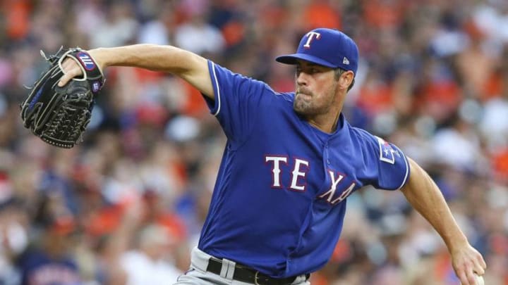 HOUSTON, TX - MAY 11: Cole Hamels #35 of the Texas Rangers pitches in the first inning against the Houston Astros at Minute Maid Park on May 11, 2018 in Houston, Texas. (Photo by Bob Levey/Getty Images)
