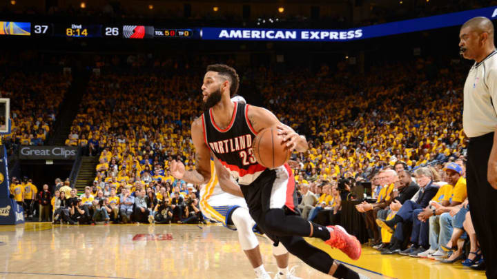 OAKLAND, CA - APRIL 19: Allen Crabbe #23 of the Portland Trail Blazers drives to the basket during the game against the Golden State Warriors during Game Two of the Western Conference Quarterfinals during the 2017 NBA Playoffs on April 19, 2017 at ORACLE Arena in Oakland, California. NOTE TO USER: User expressly acknowledges and agrees that, by downloading and or using this photograph, user is consenting to the terms and conditions of Getty Images License Agreement. Mandatory Copyright Notice: Copyright 2017 NBAE (Photo by Noah Graham/NBAE via Getty Images)