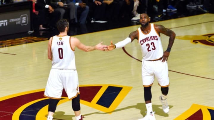 CLEVELAND, OH – JUNE 7: Kevin Love #0 and LeBron James #23 of the Cleveland Cavaliers high five each other during the game against the Golden State Warriors in Game Three of the 2017 NBA Finals on June 7, 2017, at The Quicken Loans Arena in Cleveland, Ohio. NOTE TO USER: User expressly acknowledges and agrees that, by downloading and/or using this Photograph, the user is consenting to the terms and conditions of the Getty Images License Agreement. Mandatory Copyright Notice: Copyright 2017 NBAE (Photo by Jesse D. Garrabrant/NBAE via Getty Images)
