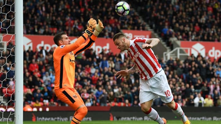 STOKE ON TRENT, ENGLAND - APRIL 29: Adrian of West Ham United and Marko Arnautovic of Stoke City clash during the Premier League match between Stoke City and West Ham United at Bet365 Stadium on April 29, 2017 in Stoke on Trent, England. (Photo by Gareth Copley/Getty Images)