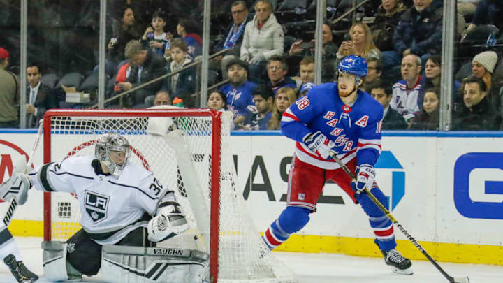 NEW YORK, NY - FEBRUARY 04: New York Rangers defenseman Marc Staal (18) looks to pass as Los Angeles Kings goaltender Jonathan Quick (32) prepares to make save during the Los Angeles Kings and New York Rangers NHL game on February 4, 2019, at Madison Square Garden in New York, NY. (Photo by John Crouch/Icon Sportswire via Getty Images)