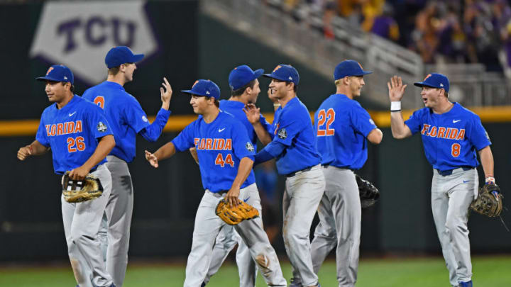 OMAHA, NE - JUNE 26: The Florida Gators celebrate after beating the LSU Tigers 4-3 in game one of the College World Series Championship Series on June 26, 2017 at TD Ameritrade Park in Omaha, Nebraska. (Photo by Peter Aiken/Getty Images)