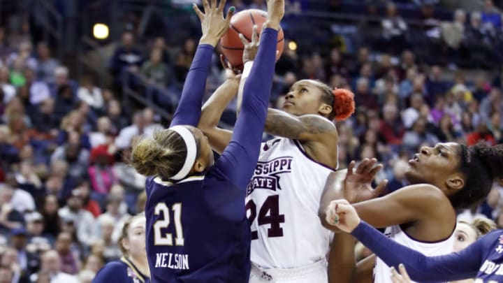 COLUMBUS, OH - APRIL 01: AJordan Danberry #24 of the Mississippi State Lady Bulldogs attempts a shot against Kristina Nelson #21 of the Notre Dame Fighting Irish during the first quarter in the championship game of the 2018 NCAA Women's Final Four at Nationwide Arena on April 1, 2018 in Columbus, Ohio. (Photo by Andy Lyons/Getty Images)