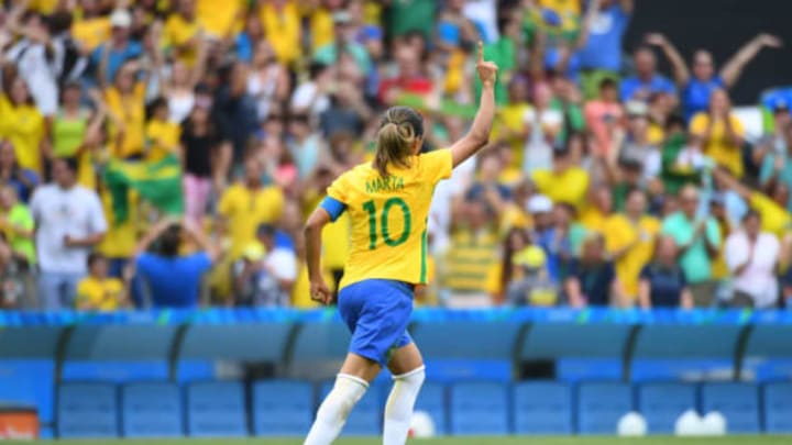 Aug 16, 2016; Rio de Janeiro, Brazil; Brazil midfield Marta (10) celebrates a shootout goal during the women’s semifinal soccer match between Brazil and Sweden at Maracana during the Rio 2016 Summer Olympic games. Sweden won the game. Mandatory Credit: Christopher Hanewinckel-USA TODAY Sports