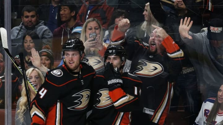 ANAHEIM, CA - JANUARY 23: Cam Fowler #4 and Adam Henrique #14 of the Anaheim Ducks celebrate a goal in the first period of the game against the New York Rangers on January 23, 2018 at Honda Center in Anaheim, California. (Photo by Debora Robinson/NHLI via Getty Images)