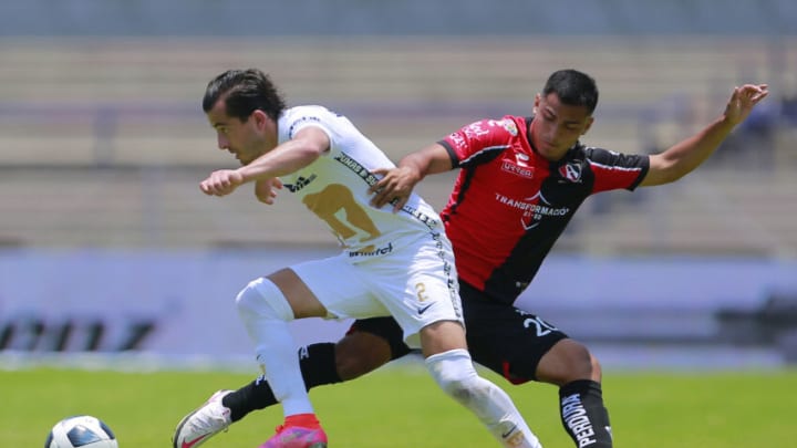 UNAM and Atlas are improbable semifinalists, but one will be playing for the trophy come next week. (Photo by Mauricio Salas/Jam Media/Getty Images)