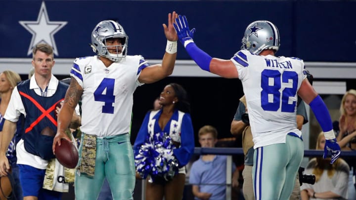 ARLINGTON, TX - NOVEMBER 05: Dak Prescott #4 of the Dallas Cowboys gets a high five from Terrance Williams #83 of the Dallas Cowboys after scrabling for a first down in the second half of a football game against the Kansas City Chiefs at AT&T Stadium on November 5, 2017 in Arlington, Texas. (Photo by Ron Jenkins/Getty Images)