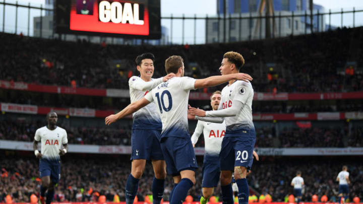 LONDON, ENGLAND - DECEMBER 02: Harry Kane of Tottenham Hotspur celebrates with teammates after scoring his team's second goal during the Premier League match between Arsenal FC and Tottenham Hotspur at Emirates Stadium on December 1, 2018 in London, United Kingdom. (Photo by Shaun Botterill/Getty Images)