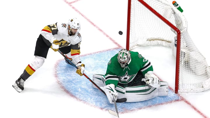 Max Pacioretty #67 of the Vegas Golden Knights attempts a shot against Anton Khudobin #35 of the Dallas Stars
