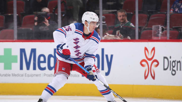 GLENDALE, ARIZONA - DECEMBER 15: Libor Hajek #25 of the New York Rangers skates with the puck during the NHL game at Gila River Arena on December 15, 2021 in Glendale, Arizona. The Rangers defeated the Coyotes 3-2. (Photo by Christian Petersen/Getty Images)