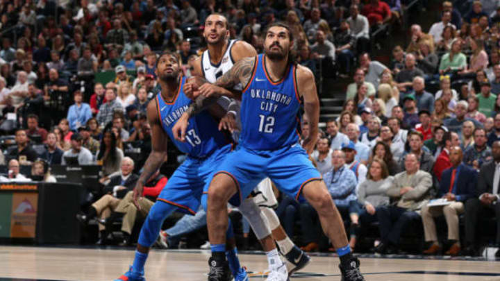 SALT LAKE CITY, UT – OCTOBER 21: Steven Adams #12 and Paul George #13 of the Oklahoma City Thunder boxes out against Rudy Gobert #27 of the Utah Jazz on October 21, 2017 at Vivint Smart Home Arena in Salt Lake City, Utah. NOTE TO USER: User expressly acknowledges and agrees that, by downloading and or using this Photograph, user is consenting to the terms and conditions of the Getty Images License Agreement. Mandatory Copyright Notice: Copyright 2017 NBAE (Photo by David Sherman/NBAE via Getty Images)