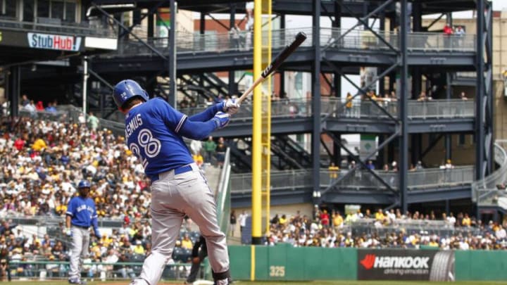 Colby Rasmus #28 of the Toronto Blue Jays hits a grand slam home run at PNC Park. (Photo by Justin K. Aller/Getty Images)