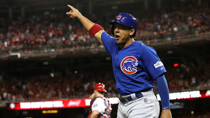 WASHINGTON, DC - OCTOBER 06: Jon Jay #30 of the Chicago Cubs reacts after scoring on a double hit by Anthony Rizzo #44 against the Washington Nationals in the 8th inning during game one of the National League Division Series at Nationals Park on October 6, 2017 in Washington, DC. (Photo by Patrick Smith/Getty Images)