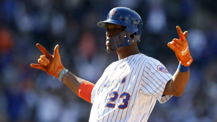 NEW YORK, NEW YORK - APRIL 06: Keon Broxton #23 of the New York Mets reacts after his eighth inning run scoring single against the Washington Nationals at Citi Field on April 06, 2019 in the Flushing neighborhood of the Queens borough of New York City. (Photo by Jim McIsaac/Getty Images)