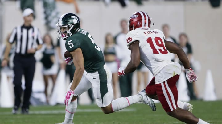EAST LANSING, MI – OCTOBER 21: Wide receiver Hunter Rison #5 of the Michigan State Spartans is pursued by defensive back Tony Fields #19 of the Indiana Hoosiers during the second half at Spartan Stadium on October 21, 2017 in East Lansing, Michigan. Michigan State defeated Indiana 17-9. (Photo by Duane Burleson/Getty Images)