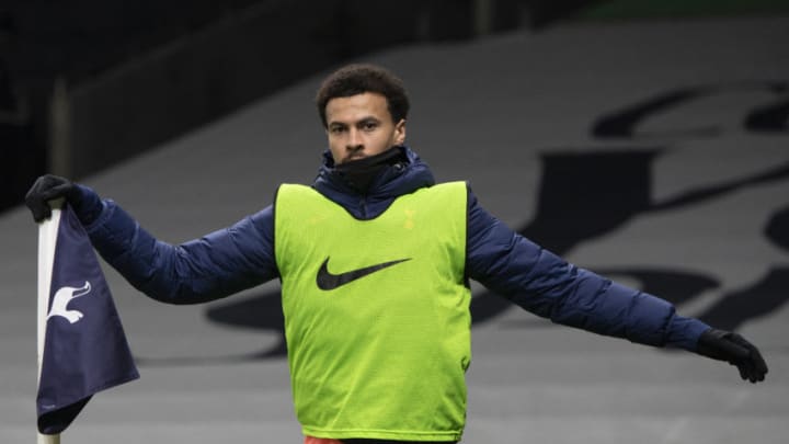 LONDON, ENGLAND - JANUARY 13: Dele Alli of Tottenham Hotspur warms up during the Premier League match between Tottenham Hotspur and Fulham at Tottenham Hotspur Stadium on January 13, 2021 in London, England. Sporting stadiums around England remain under strict restrictions due to the Coronavirus Pandemic as Government social distancing laws prohibit fans inside venues resulting in games being played behind closed doors. (Photo by Visionhaus)