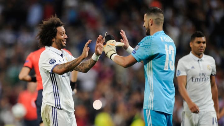 Marcelo of Real Madrid Cf celebrates with Kiko Casilla after beating Sporting Clube de Portugal 2-1 in the UEFA Champions League Group F match between Real Madrid CF and Sporting Clube de Portugal at Estadio Santiago Bernabeu on September 14, 2016, in Madrid, Spain. (Photo by Denis Doyle/Getty Images)