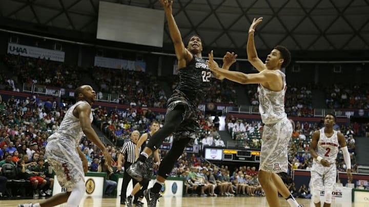 Nov 11, 2016; Honolulu, HI, USA; Michigan State Spartans forward Miles Bridge (22) lays the ball in against the Arizona Wildcats at the Stan Sheriff Center. Arizona defeats Michigan State 65-63. Mandatory Credit: Brian Spurlock-USA TODAY Sports