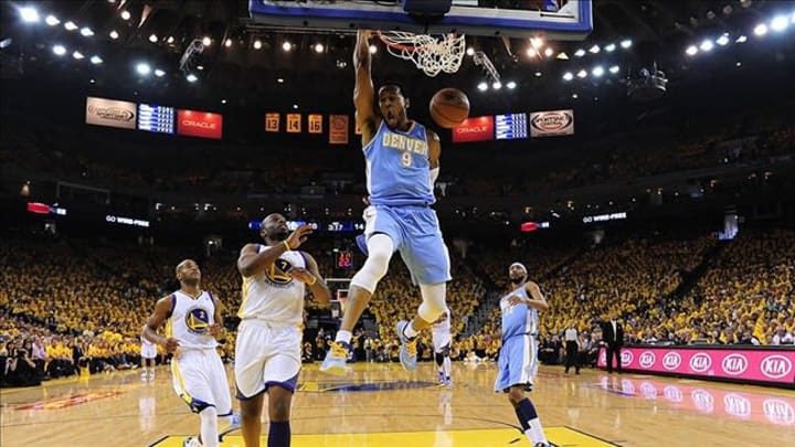 April 28, 2013; Oakland, CA, USA; Denver Nuggets shooting guard Andre Iguodala (9) dunks against the Golden State Warriors during the first quarter in game four of the first round of the 2013 NBA playoffs at Oracle Arena. The Warriors defeated the Nuggets 115-101. Mandatory Credit: Kyle Terada-USA TODAY Sports